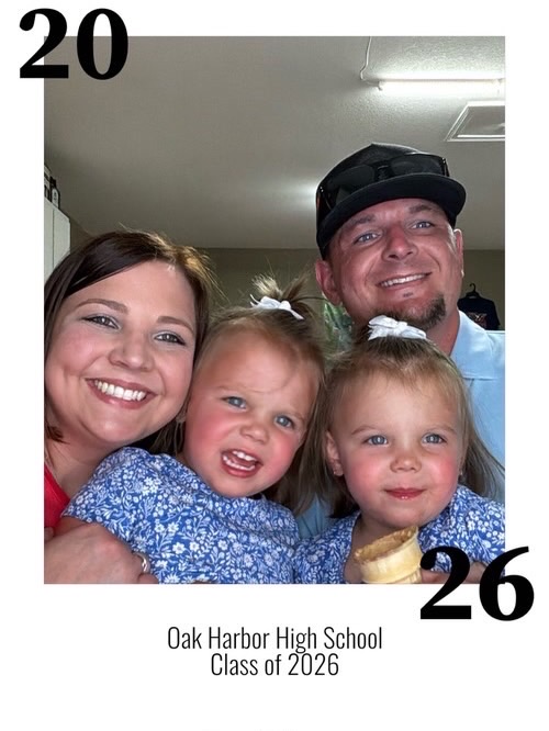 Family with children smiling in an Oak Harbor High School Class of 2026 photo booth capture.